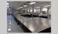 Joining Optical Tables with Rigid Couplings